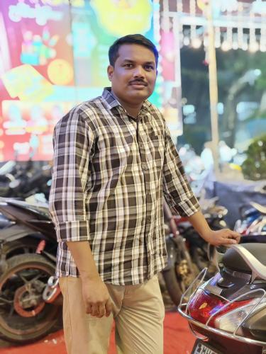 TEJAS MOHAN PUJARI